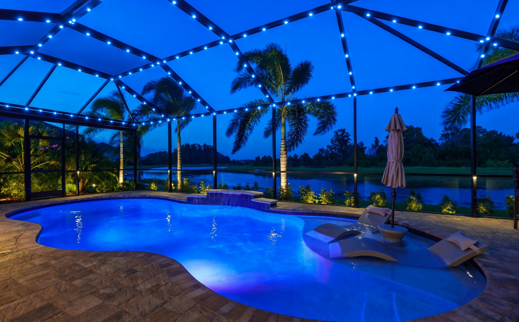 Pool cage at dusk with saturated blue puck lights on the large beams