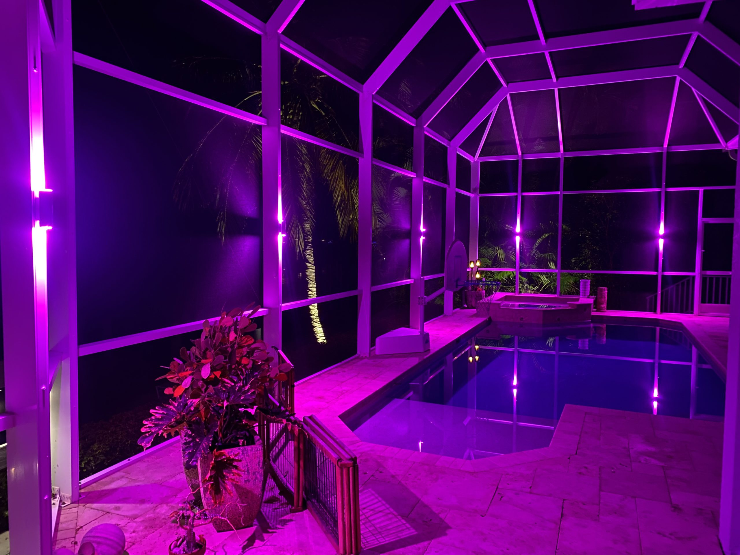 Lanai pool cage lighting with permanent LED sconces, Pinellas County