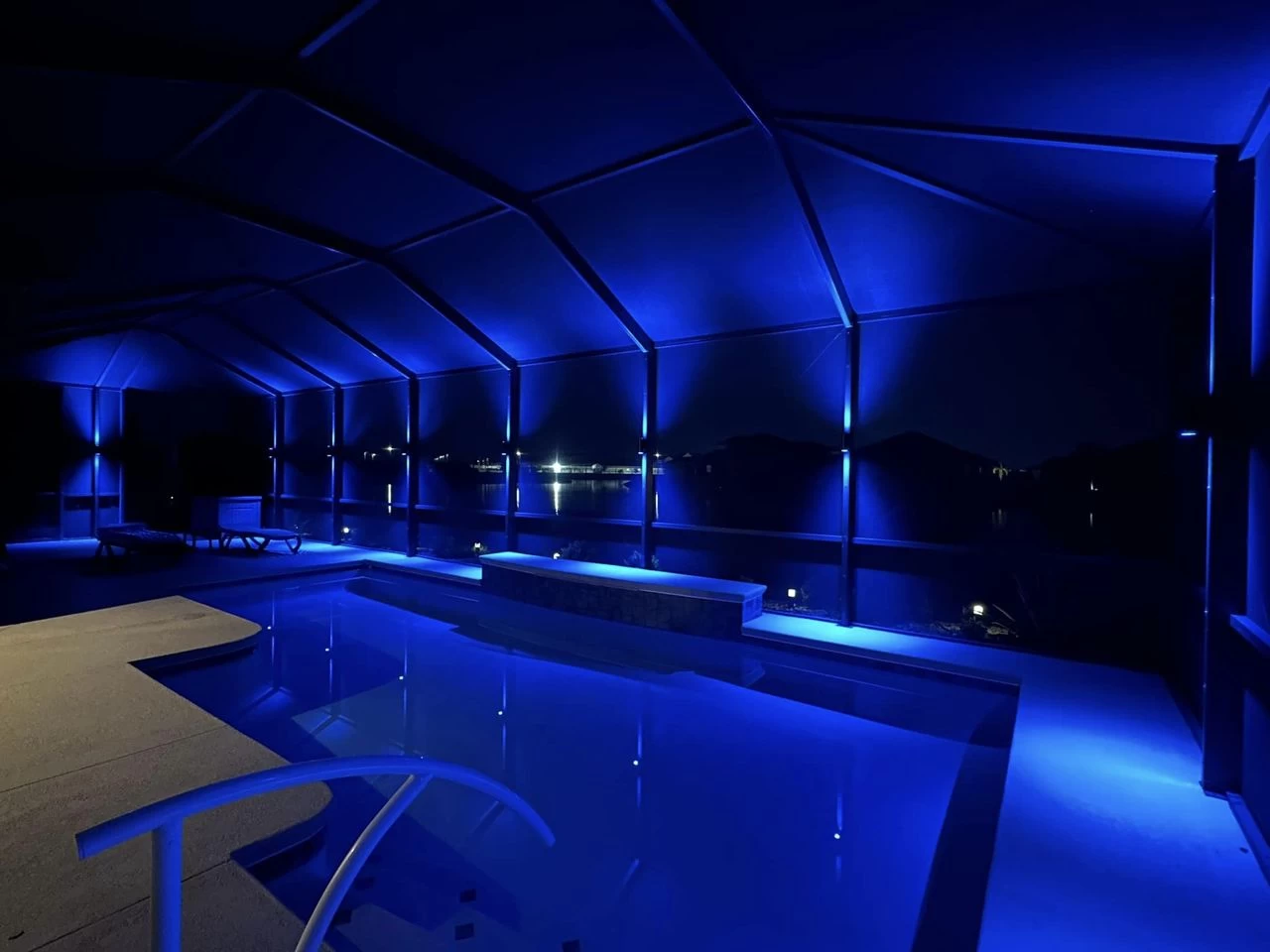 Permanent pool sconce lighting installation in Seminole, Florida