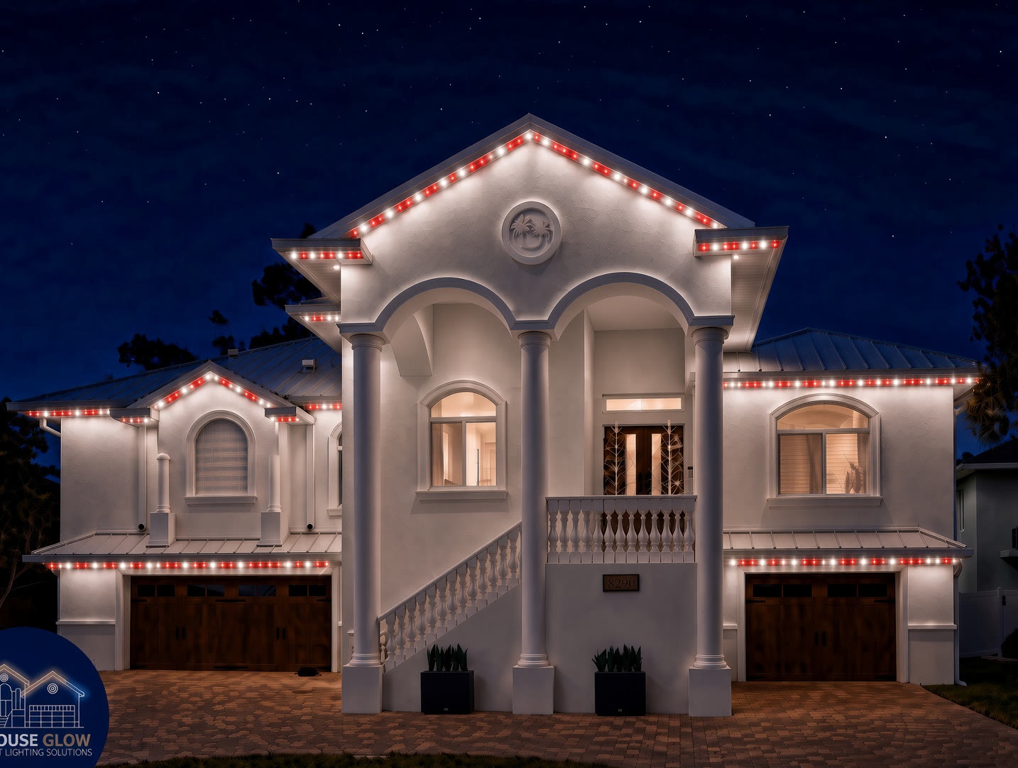 Palm Harbor home with permanent Christmas lights at dusk